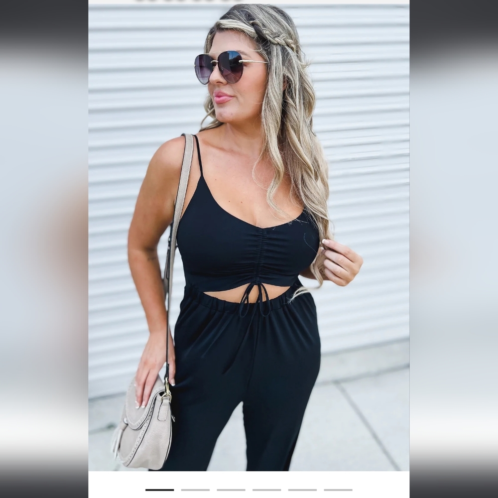 Super cute cutout jumpsuit.Never worn.